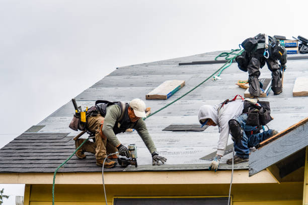Professional Gutter Installation technician working in Fort Bragg, NC